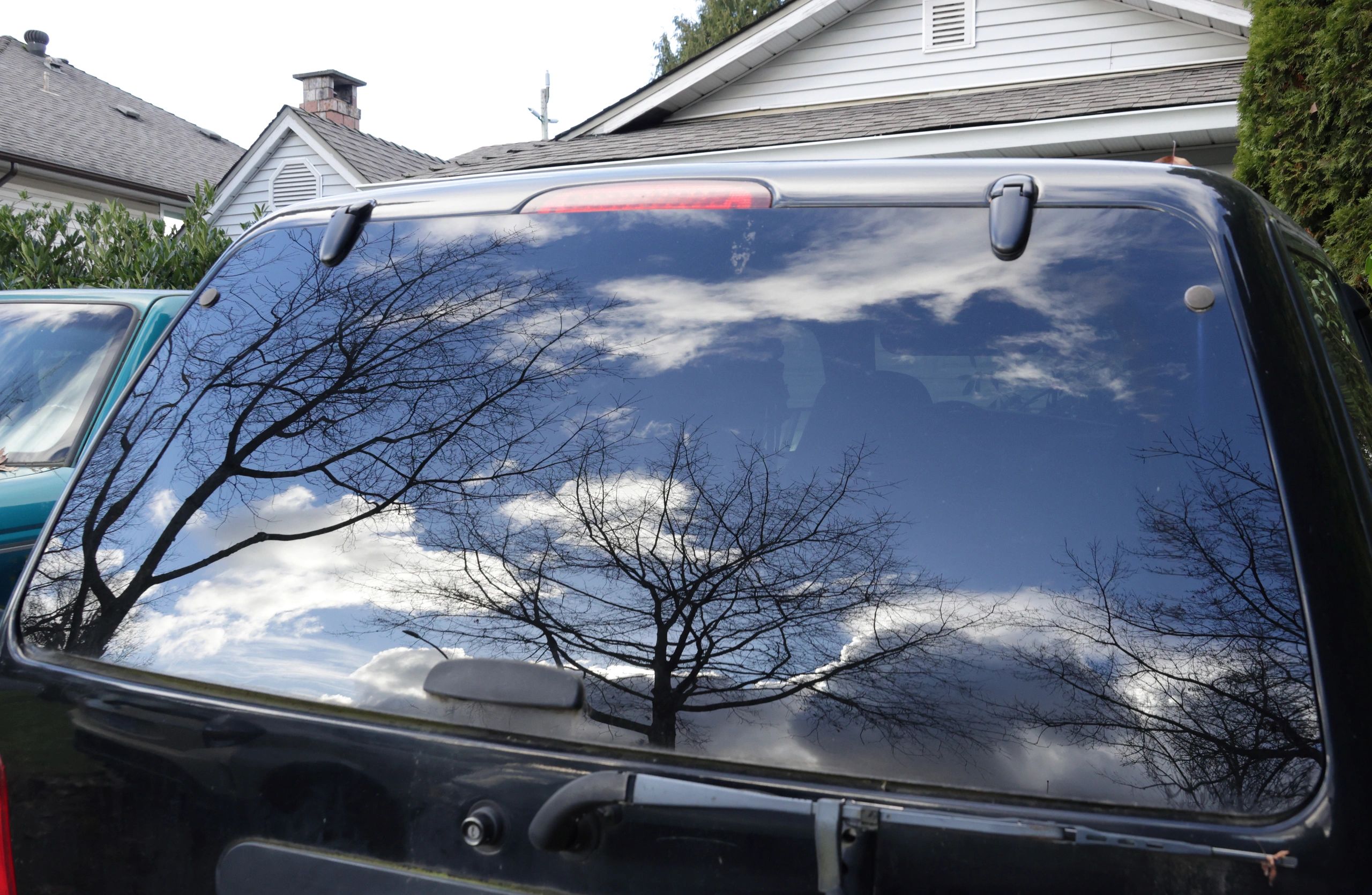 Luxury vehicle showcased with polished showroom lighting