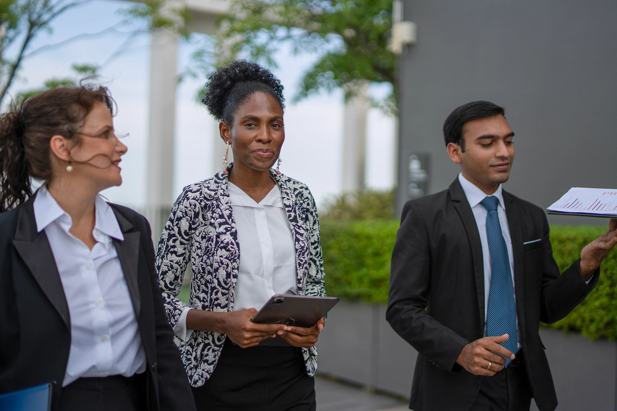 Luxury dealership team in discussion